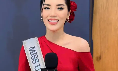 Ngày đầu nhập cuộc Miss Universe Kỳ Duyên chọn thiết kế áo dài đỏ rực nổi bật giữa dàn thí sinh