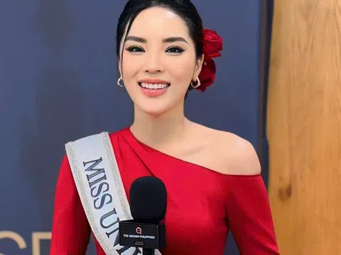 Ngày đầu nhập cuộc Miss Universe Kỳ Duyên chọn thiết kế áo dài đỏ rực nổi bật giữa dàn thí sinh